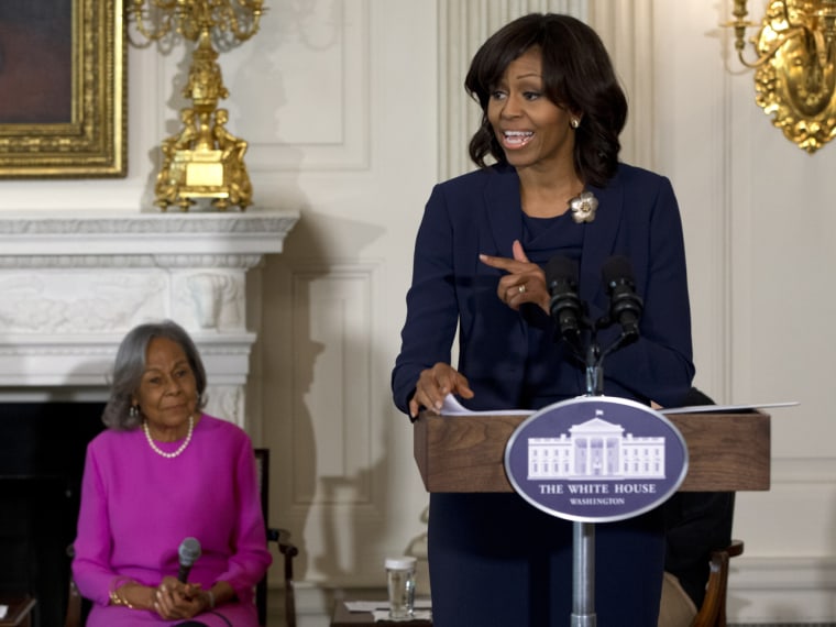 First Lady Michelle Obama introduces a panel of the cast and crew of the movie \"42\", next to Rachel Robinson, widow of baseball great Jackie Robinson, before a workshop for high school and college students on Tuesday at the White House.