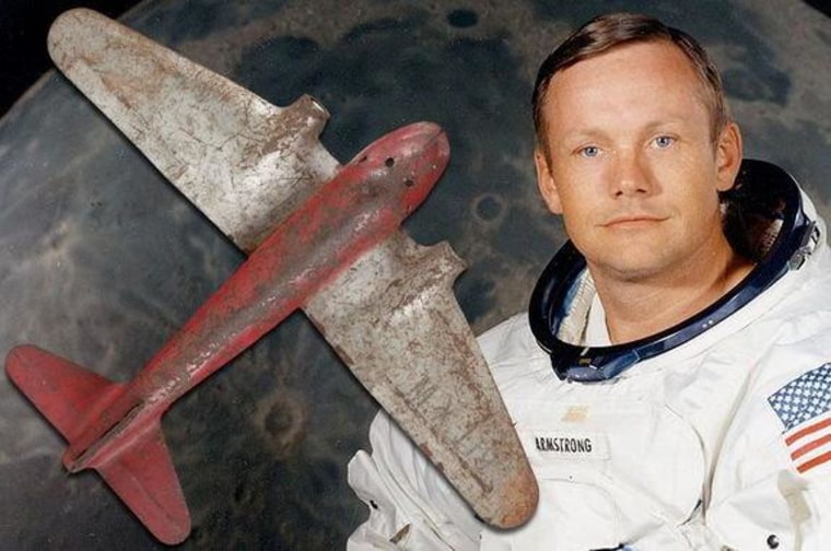 Long before Neil Armstrong flew to the moon, he played with this red metal toy plane, which is now up for auction by Heritage Auctions of Dallas.