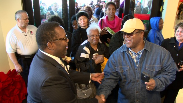 Wendell Pierce welcomes the first customers inside his 25,000 square-foot store.