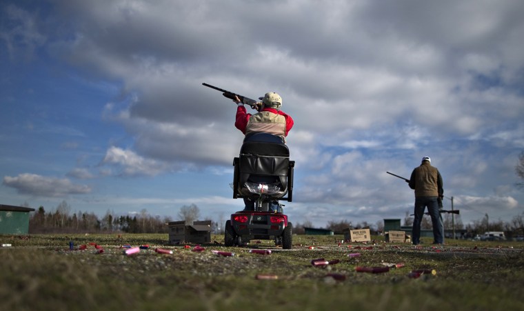 A member of the Vancouver Gun Club, which was formed in 1924, takes aim while trap shooting at the club facility in Richmond, British Columbia Feb. 10.