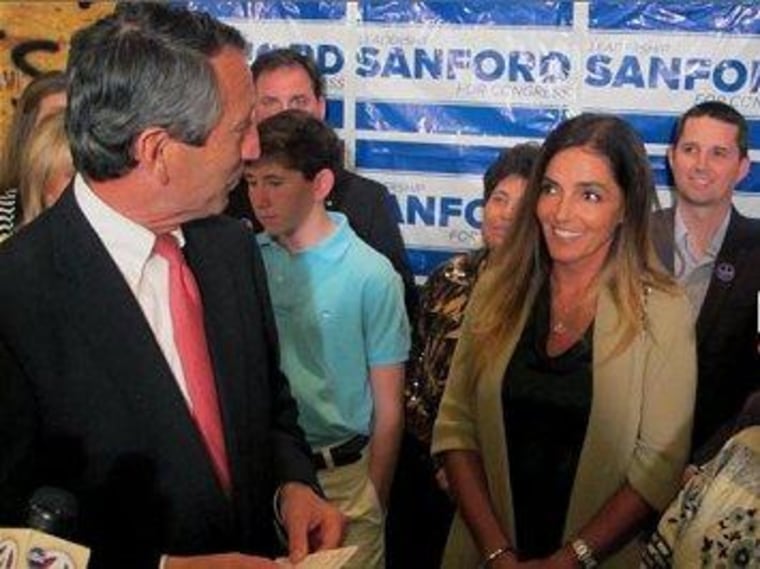 Former South Carolina Gov. Mark Sanford (R) thanks his fiance and former mistress, Maria Belen Chapur, after his primary win