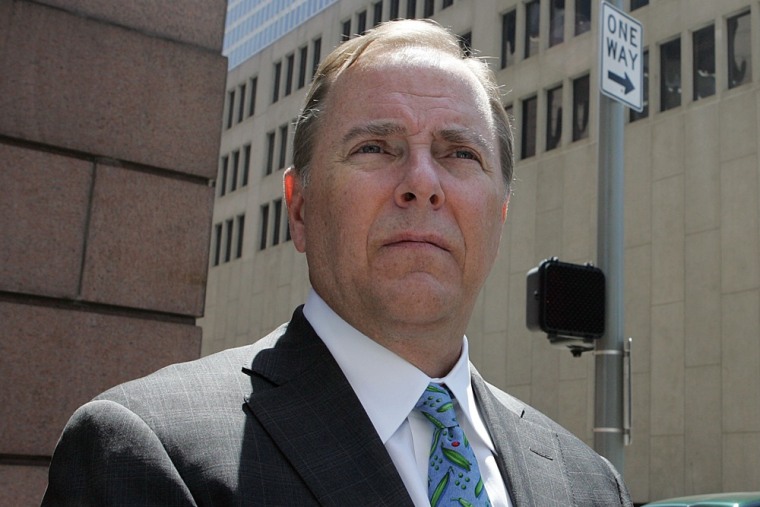 In this file photo, Former Enron CEO Jeffrey Skilling returns to the Bob Casey Federal Court House after a lunch break in the Enron trial April 10, 20...