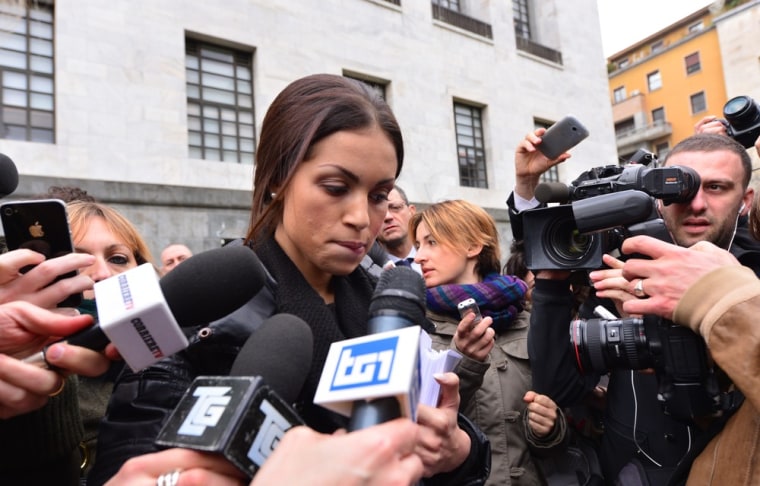 Exotic dancer Karima El Mahroug, nicknamed Ruby the Heart Stealer, speaks to journalists at Milan's courthouse on Thursday during a protest against the trial of former Italian premier Silvio Berlusconi.