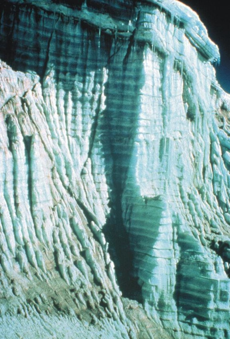 This photo from a 1977 expedition to Quelccaya Ice Cap in Peru shows annual layers of ice and dust visible in the ice cap's margin.