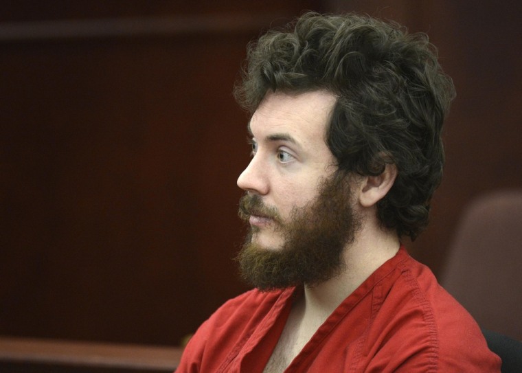 Accused Aurora theater shooting suspect James Holmes listens at his arraignment in Centennial, Colorado in this file photo taken March 12, 2013.