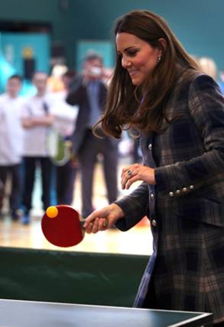 Image: Duchess Kate plays table tennis.