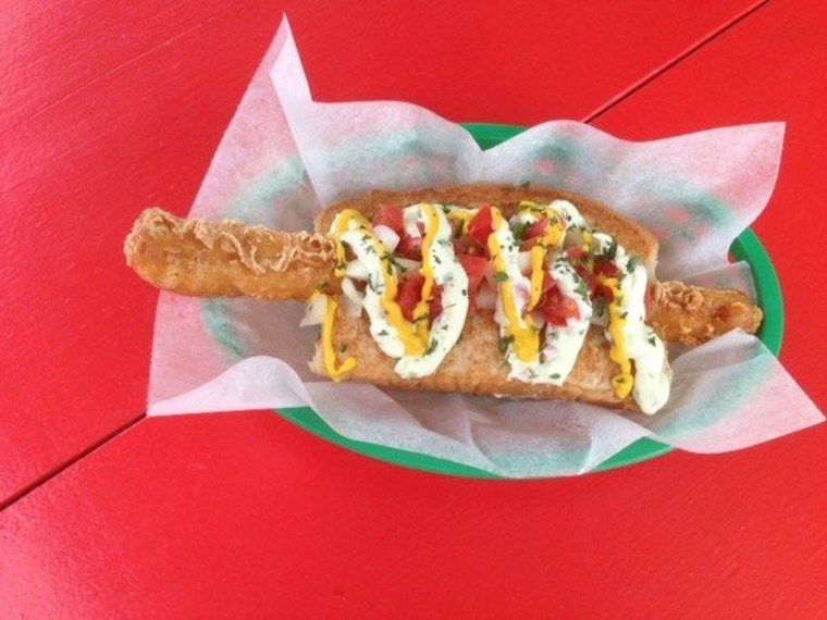 Alongside sausages from Germany and Slovenia, Dat Dog offers crawfish dogs and a \"sea dog\" made with a white cod filet fried in tempera batter and served with homemade tartar sauce.