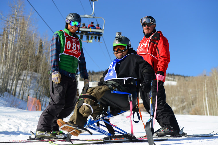 Carlos Figueroa monoskis in Aspen Snowmass on Thursday as part of a VA sports clinic for disabled veterans.