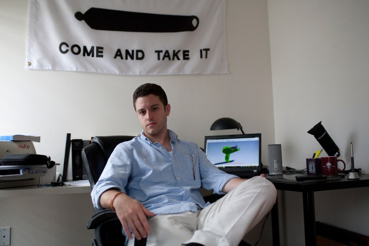 FILE -- Cody Wilson, who is in the process of developing a gun that will be printed on a 3-D printer, in Austin, Texas, Oct. 4, 2012. Recent gunmaking...