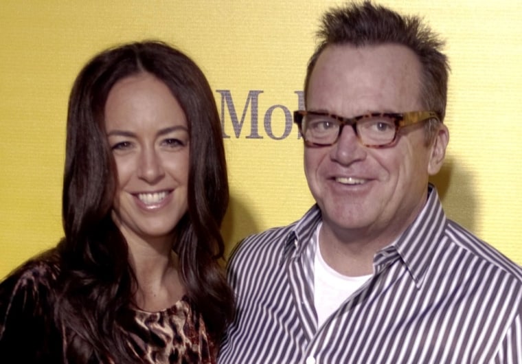 Tom Arnold and wife Ashley Groussman welcomed a baby boy Saturday morning.