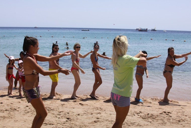 Hotel recreation staff lead tourists in an aerobics class on Naama Bay beach in the South Sinai resort city of Sharm el-Sheikh.