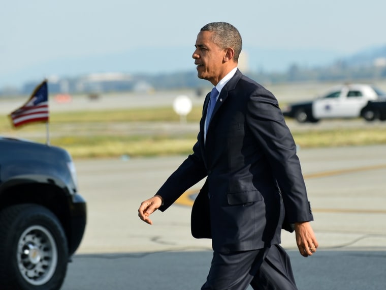 President Barack Obama walks to his car as he arrives at San Francisco International Airport in San Francisco, Calif., on April 3, 2013.