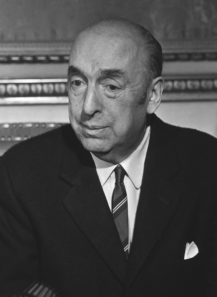 A photo from Oct. 21, 1971, shows writer, poet and diplomat Pablo Neruda, then Chilean ambassador to France, answering journalists' questions in Paris. Neruda's remains were exhumed Monday in an effort to determine whether he was poisoned.