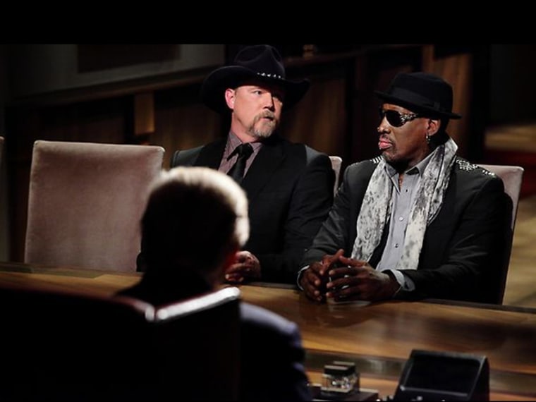 Dennis Rodman, right, and Trace Adkins in the boardroom on