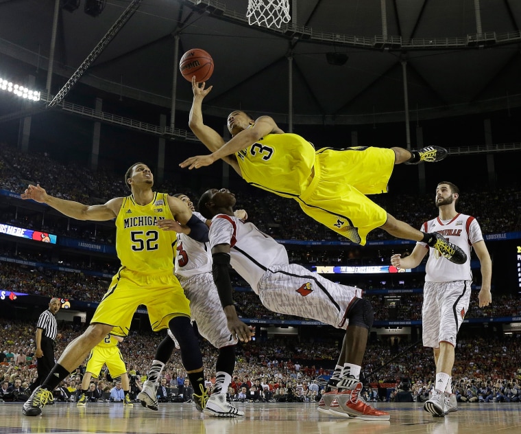 Louisville Fights Back To Win NCAA Championship, Tops Michigan 82-76