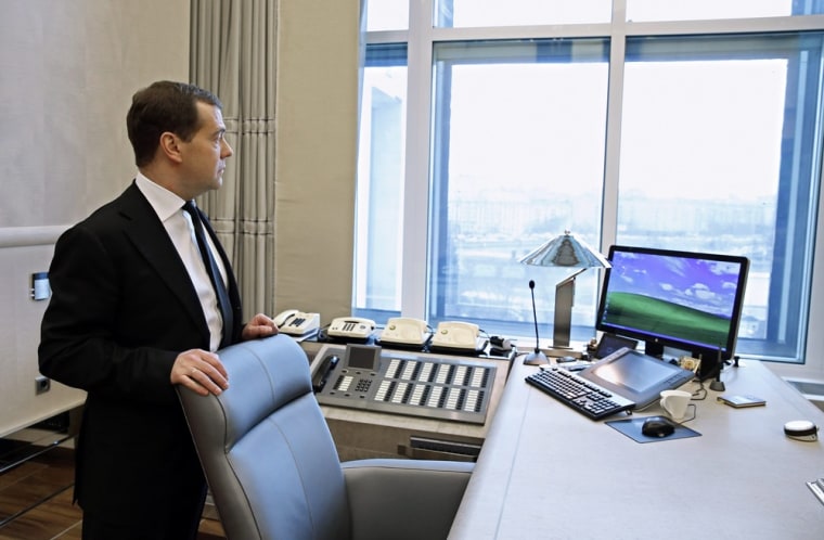 Russian Prime Minister Dmitry Medvedev stands in his office in Moscow on April 9, 2013, before an interview with a Russian television channel.
