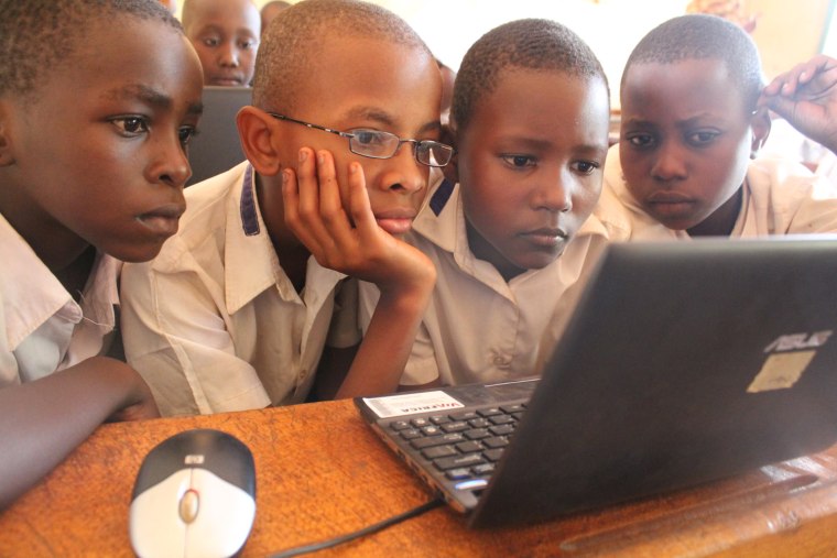 Students at the Shirimatunda Primary School in Tanzania use a Swahili version of an online course about AIDS created by a company called TeachAIDS.