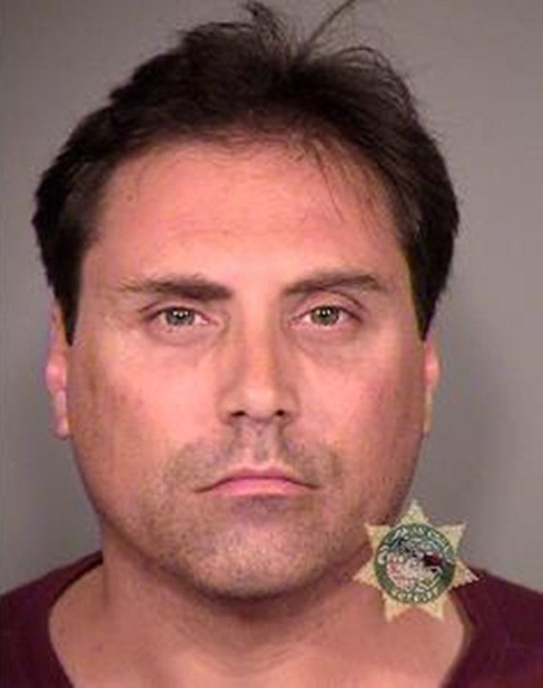Kevin Purfield, 45, of Portland, Oregan was held in connection with multiple harassing phone calls and contacts to families of shooting victims from the July 2012 mass shooting in Aurora, Colorado.