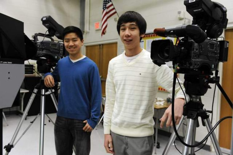 In their film, Troy students Jason Ji, left, and Frank Boudon make the case that the nation's poverty crisis could be solved by reforming education.