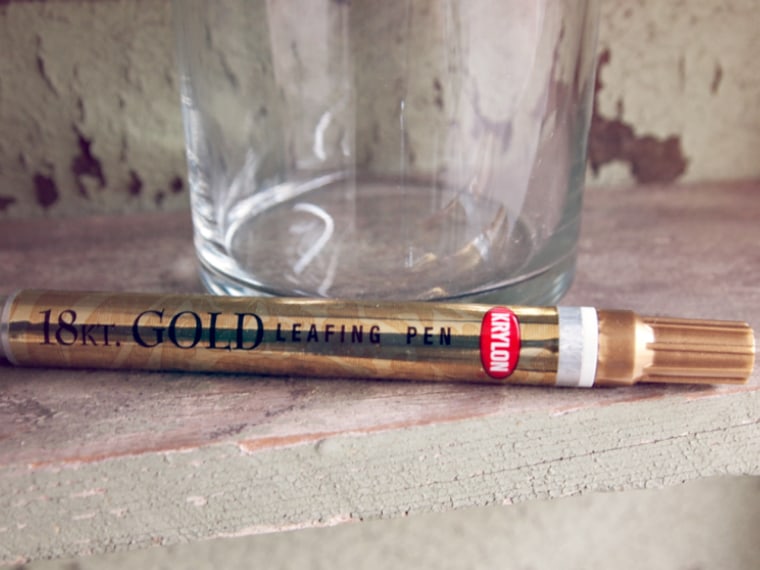 Krylon makes a really great gold leafing paint pen. They can be purchased at your local craft or art supply store in packs of two for around $5. It's ...