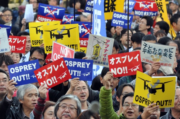 Protesters demonstrate against aircraft deployment at Marine Corps Air Station Futenma in Okinawa during a Tokyo rally in November. More protests are planned over the large U.S. military presence on the island prefecture.
