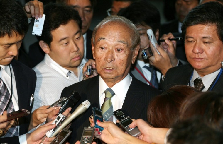 Okinawa Gov. Hirokazu Nakaima speaks to reporters in October after two U.S. servicemen were charged with the rape of a Japanese woman on the island. Nakaima is fighting plans to build a new Marine Corps air base in the seaside village of Henoko.