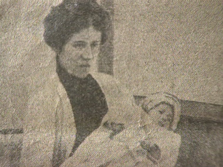 Titanic survivor Millvina Dean is shown photographed with her mother.