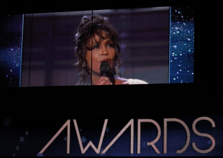 Whitney Houston is shown on a screen at the Grammys