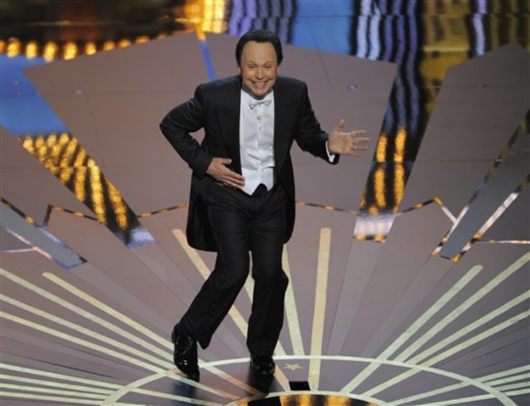 Billy Crystal performs during the 84th Academy Awards on Sunday, Feb. 26.