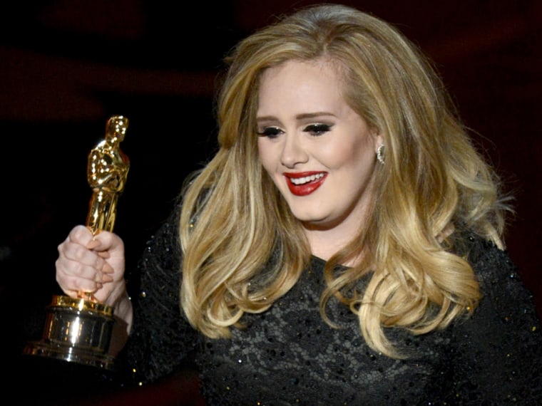 Adele accepts the Oscar for best original song for \"Skyfall.\"
