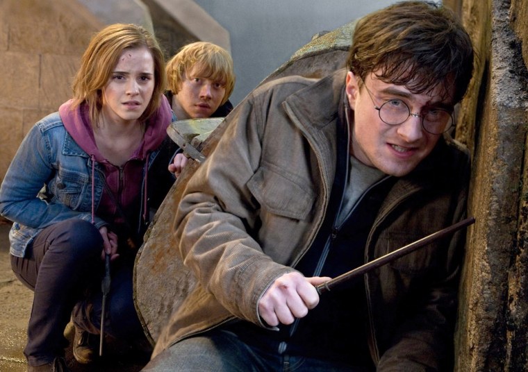 Daniel Radcliffe, right, who stars as Harry Potter alongside Emma Watson and Rupert Grint, is a bit annoyed that the film series never got a best picture nod.
