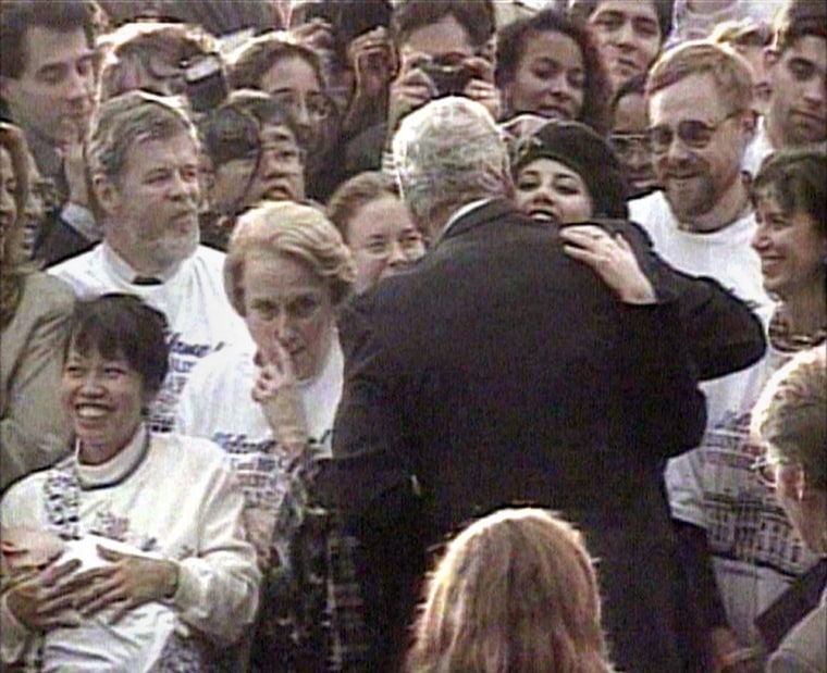 President Clinton hugs Monica Lewinsky during a rally at the White House on Nov. 6, 1996.