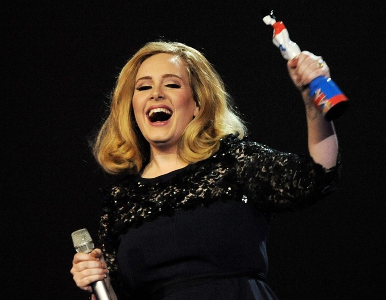 Adele accepts the best album award during the BRIT Awards 2012 held at the O2 Arena on Feb. 21 in London.