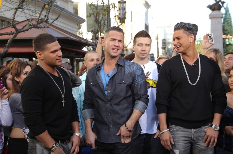 The guys (from left, Ronnie Magro, Michael \"The Situation\" Sorrentino, Vinny Guadagnino and Paul 'Pauly D' Delvecchio) and gals are back from Italy and ready to kick up American sand on \"Jersey Shore.\"