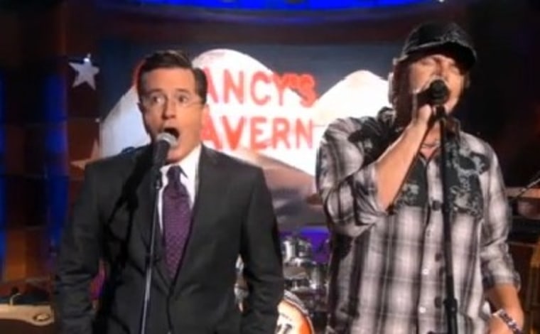 Stephen Colbert joined country star Toby Keith for a version of \"The Star-Spangled Banner\" that had the \"Colbert Report\" crowd cheering.