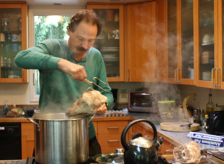 Jeff Yeager cooks goat heads for one of his frugal meals on \"Extreme Cheapskates.\"