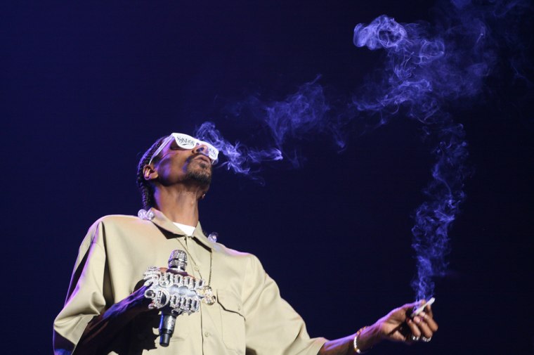 Rapper Snoop Dogg -- now Snoop Lion -- performs at The Wiltern in Los Angeles in 2011.