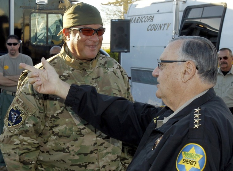 Maricopa County Sheriff Joe Arpaio, right, talks with actor Steven Seagal at the Maricopa County Sheriff's Training Academy on Thursday, Jan. 27, 2011, in Phoenix.