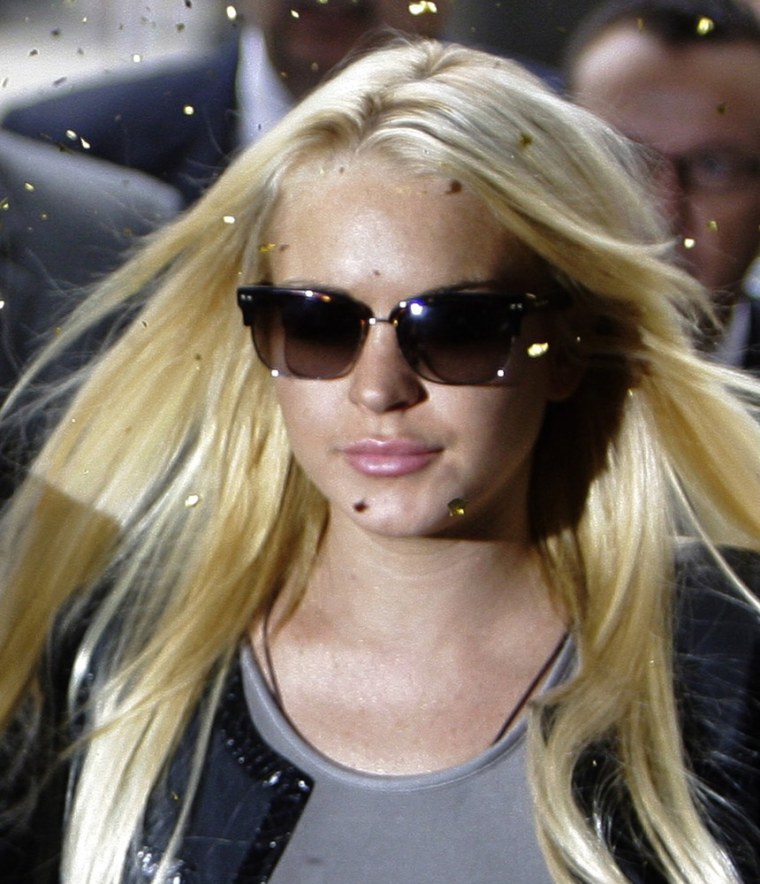 Lindsay Lohan was showered with confetti as she headed to court on July 20.