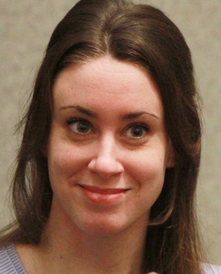 Casey Anthony smiles before the start of her sentencing hearing on charges of lying to a law enforcement officer at the Orange County Courthouse July 7, 2011 in Orlando, Fla.