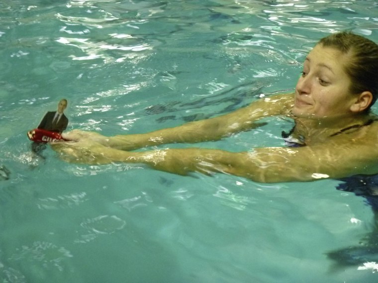 \"Matt\" is swimming in a pool with Kris Miller in Granville, Ohio.