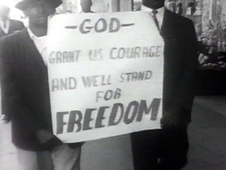 Mail carrier James Hundley, marching as part of the civil rights movement.