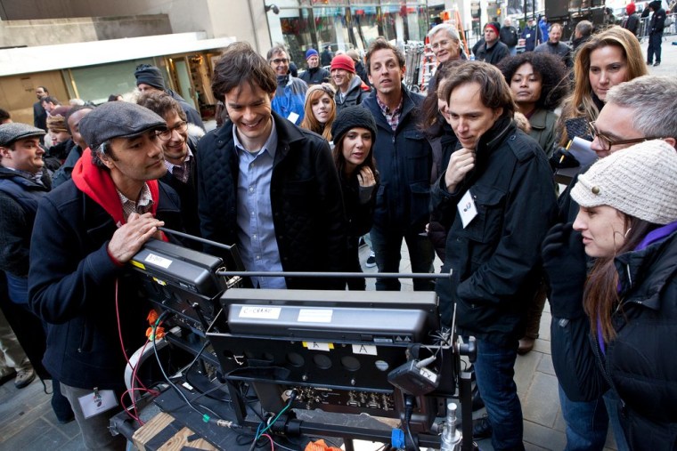 \"Saturday Night Live\" cast view their performances during the \"Brotherhood of Man\" shoot on Rockefeller Plaza.