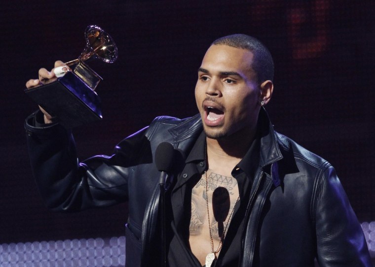 Chris Brown accepts the award for best R&B album for