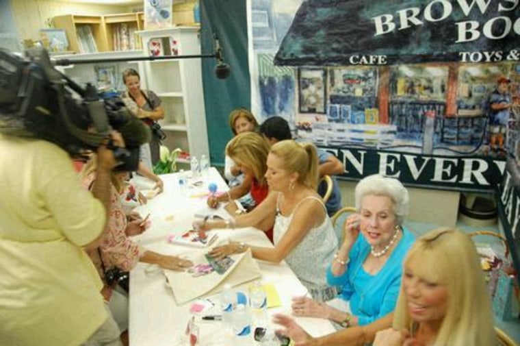 Kathie Lee and Hoda sign their books for fans at Browse About Books.