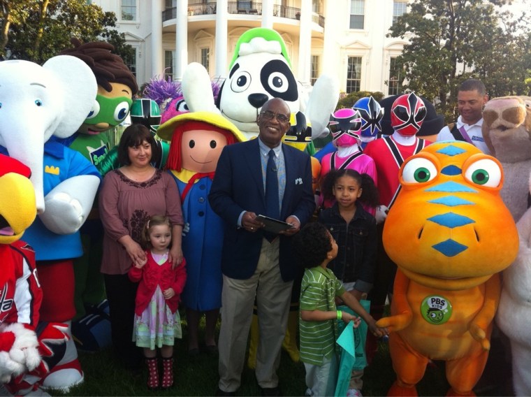 Characters on the White House lawn.