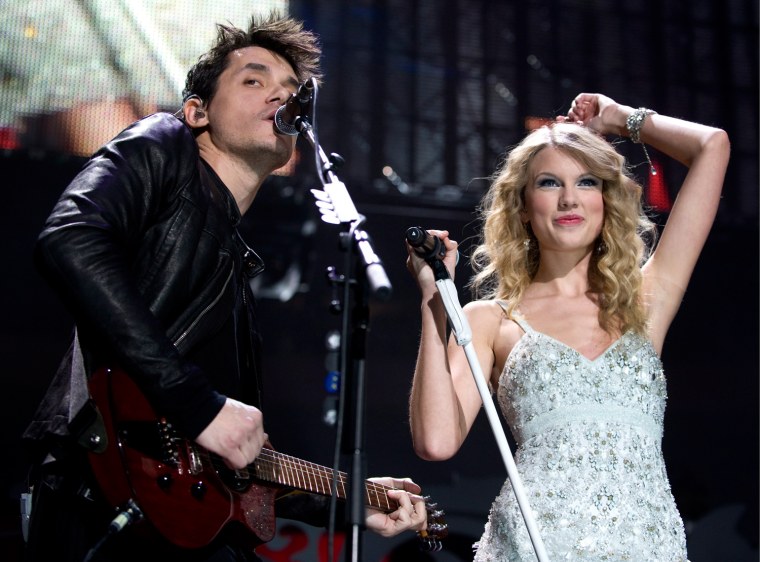 In happier times: John Mayer performing on stage with Taylor Swift in 2009.