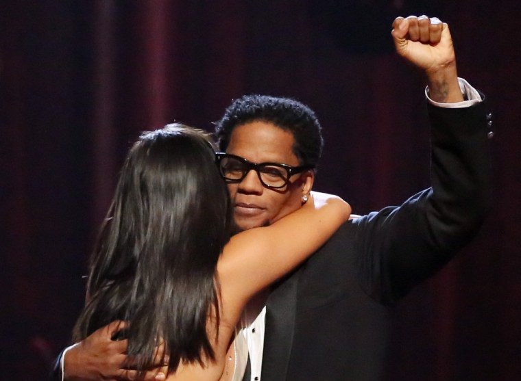 Comedian D.L. Hughley and pro partner Cheryl Burke were eliminated Tuesday.