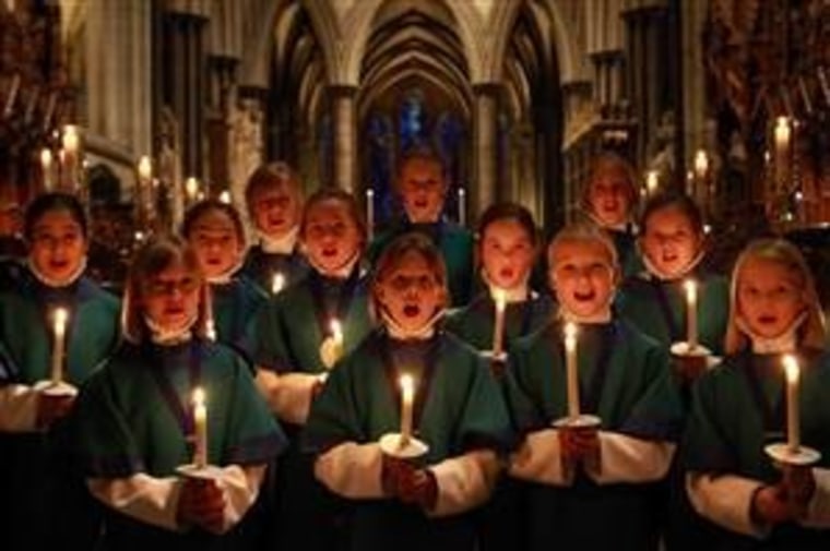 These members of the Salisbury (England) Cathedral Choir, shown practicing for Christmas Eve services, have likely caused some chills.