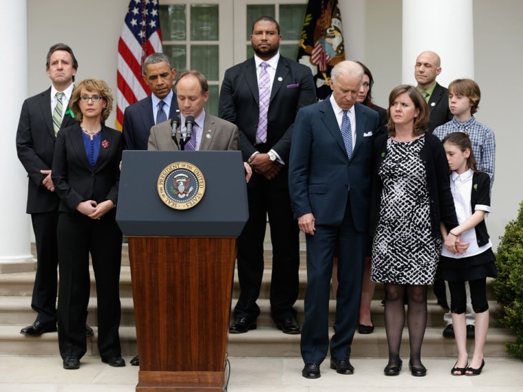 Father of Sandy Hook Elementary School shooting victim, Mark Barden introduces President Barack Obama as former Rep. Gabrielle Giffords, Vice President Joe Biden and family members of the Newtown shooting victims look on in the Rose Garden of the White House on April 17, 2013.